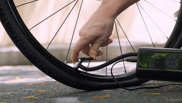 Auto Air tire pump in use